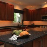 A Kitchen Space With Granite Counter Tops