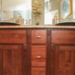 Beautiful Brown Cabinet With Decor on Top
