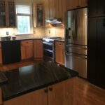 Marble Countertop and Brown Cabinets