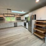 Lavish White Kitchen With Multiple Cabinets